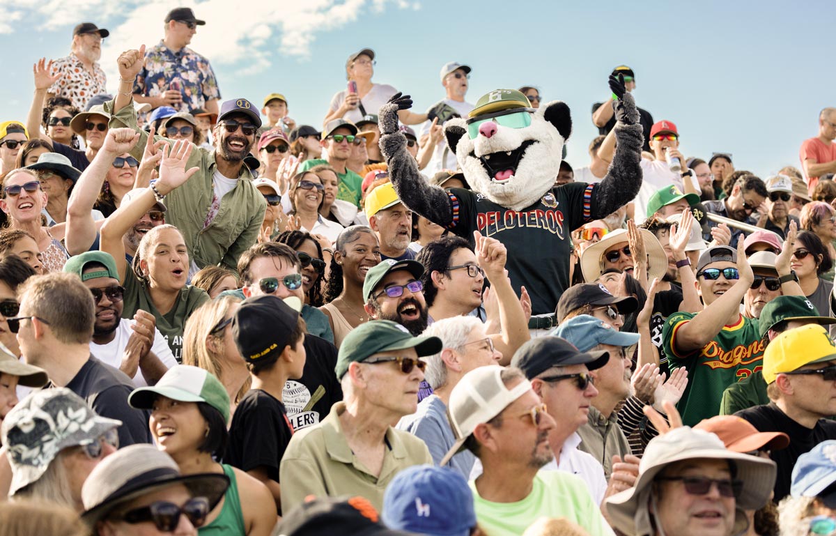 Scrappy the Rally Possum in the Cheering Crowd at Raimondi Park at a Ballers Game